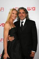 Kelly Lynch and Mitch Glazer arrive at the AFI Salute to Warren Beatty at the Kodak Theater in Los Angeles, CA June 12, 2008 photo