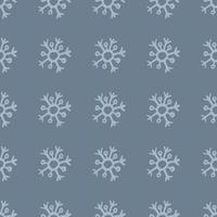 Seamless background of hand drawn snowflakes. White snowflakes on blue background. Christmas and New Year decoration elements. Vector illustration.