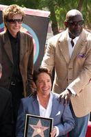 Barry Manilow, Chris Gardner and Dave Koz at the Hollywood Walk of Fame Star Ceremony honoring Dave Koz Capital Building in Hollywood Los Angeles, CA September 22, 2009 photo