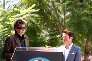 Barry Manilow and Dave Koz at the Hollywood Walk of Fame Star Ceremony honoring Dave Koz Capital Building in Hollywood Los Angeles, CA September 22, 2009 photo