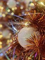Christmas ball on tree background. Happy New year and Merry Christmas  2023 celebration concept