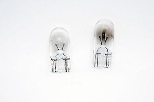 Halogen T10 W5W 12v bulb. Broken bulb. photo