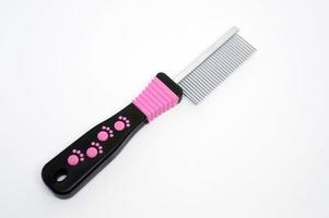Comb type for removing hairballs and styling  cat's fur photo