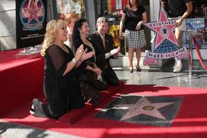 tanya tucker, vendaval de cristal, guiño martindale, leron gubler en la ceremonia de la estrella del paseo de la fama de hollywood para crystal gayle on vine, justo al norte de sunset blvd los angeles, ca 2 de octubre de 2009 foto