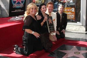 tanya tucker, vendaval de cristal, guiño martindale, leron gubler en la ceremonia de la estrella del paseo de la fama de hollywood para crystal gayle on vine, justo al norte de sunset blvd los angeles, ca 2 de octubre de 2009 foto