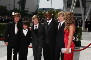 Teen Stars, Sprouse Brothers, Hannah Montana Cast arriving at the Creative Primetime Emmy Awards at the Nokia Theater, in Los Angeles, CA on September 13, 2008 photo