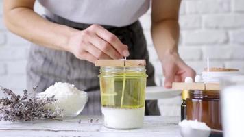 woman making candles video