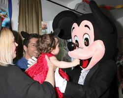 LOS ANGELES, DEC 4 - Adrienne Frantz Bailey, Amelie Bailey, Scott Bailey, Mickey Mouse character at the Amelie Bailey s 1st Birthday Party at Private Residence on December 4, 2016 in Studio CIty, CA photo