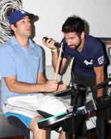 Zachary Levi and Joshua Gomez Chuck Kickoff party presented by Guitar Hero Five Roosevelt Hotel Pool Los Angeles, CA October 10, 2009 photo