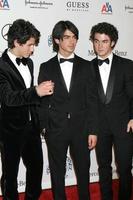 Jonas Brothers arriving to the Carousel of Hope Ball at the Bevelry Hilton Hotel, in Beverly Hills, CA on October 25, 2008 photo