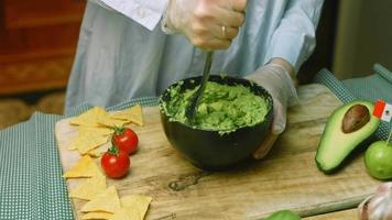 Guacamole salad with nachos and Mexican flag video