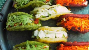 The chef prepares tacos. Add chopped fresh salad video