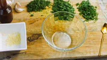 Macro filming of Worcestershire sauce. The chef pours the sauce into a spoon video