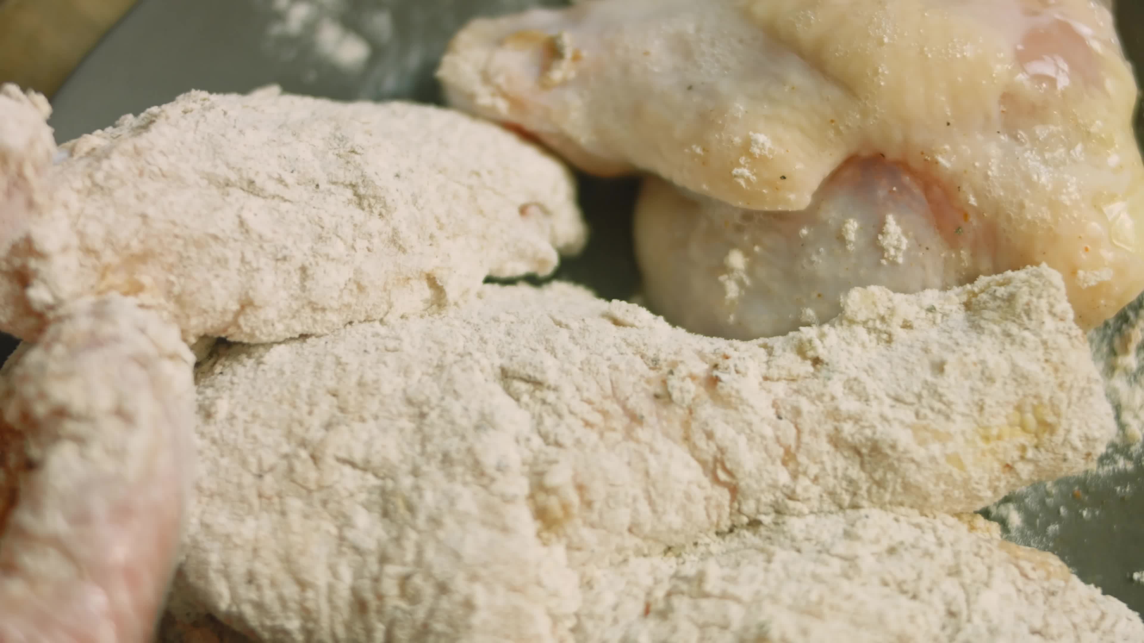 Meat meat in flour with spices. I preparing fried chicken 14700182 Stock Video at Vecteezy