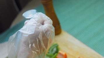 Beef marinated in soy sauce in plastic wrap on a retro tray. Macro shooting. There are air bubbles video