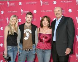 Phil McGraw and wife, son,guest MGM Garden Arena Las Vegas, NV May 23, 2006 photo