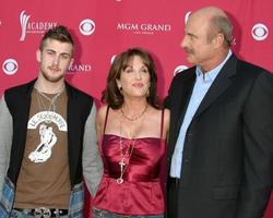 Phil McGraw and wife, son,guest MGM Garden Arena Las Vegas, NV May 23, 2006 photo