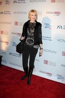 Kathryn Morris arriving at the Children Mending Hearts Event at the House of Blues in Los Angeles, CA on February 18, 2009 photo