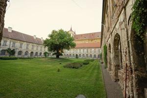 Courtyard with peacocks of Benedictine monastery in Rajhrad photo