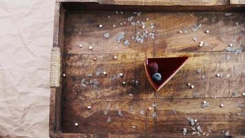 Berry breeze cake on a wooden tray with decorations video