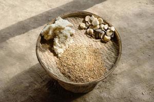 Food for elephants - sticky rice, bananas and oats on a bamboo basket. photo