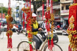 Vietnamese New Year decoration on a blurred background of a street. Hue, Vietnam. photo