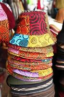 Colorful summer hats on a street market. Chiang Mai, Thailand. photo