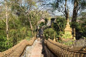 Stairs of Mount Phousi is a hill right at the centre of the old town of Luang Prabang. It is bordered on one side by the Mekong River and on the other side by the Khan River. photo