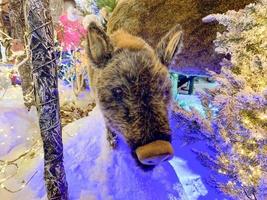 cerdos y jabalíes, adornos y juguetes navideños foto