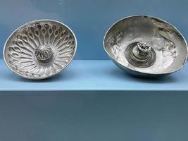 An ancient silver bowl used for water photo