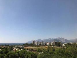 Skyline of Providencia district in Santiago de Chile with snowed Andes mountain range in the background. This is a wealthy residential and commercial district in the city photo