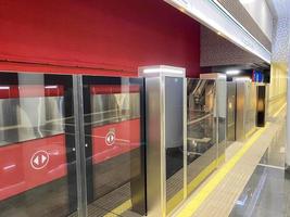 Platform screen door or Automatic platform gate at Metro station of Line photo