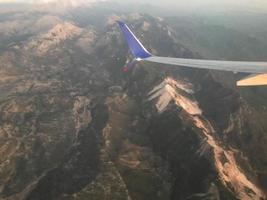 View of the airport and airplane wing from the Inside photo