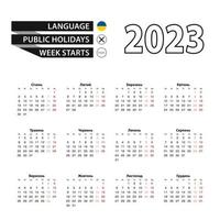 calendario 2023 en idioma ucraniano, la semana comienza el lunes. vector