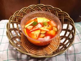 a bowl of delicious and fresh fruit salad photo