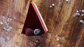 Berry breeze cake on a wooden tray with decorations video