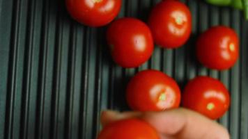 Grill tomatoes with red and green pepper video