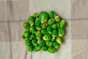 Brussels sprouts close-up on a beautiful stand, healthy vegetables. Healthy food. photo