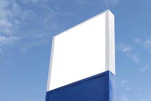 Outdoor billboard on blue sky background with white background mock up. clipping path photo