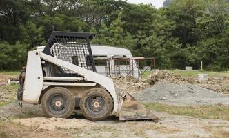 Mini excavator at the construction site. photo