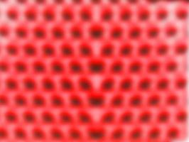 plantilla de fondo abstracto de punto rojo. enfoque borroso foto