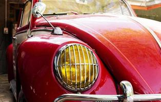 Close up headlamp red retro car photo