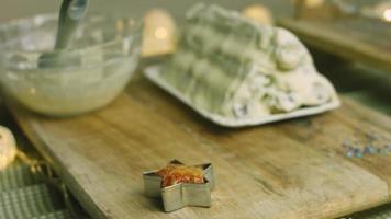 Cake with green dough, sour cherries and sour cream. It also has food ornament and the red star cake video