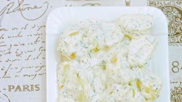 Such a tender potato salad with mastard, mayonnaise, red onion and dill. Wath the recipe in video