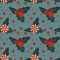 Seamless pattern of Christmas candies and holly on blue background vector