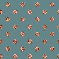 Seamless pattern of Christmas candies on blue background vector