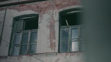 Very old house in deplorable condition. Broken and vandalized windows video