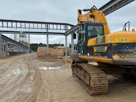 construction equipment in construction new warehouse background photo