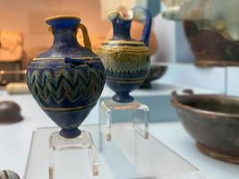 Clay jugs, old ceramic vases on table photo