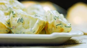 Such a tender potato salad with mastard, mayonnaise, red onion and dill. Wath the recipe in video